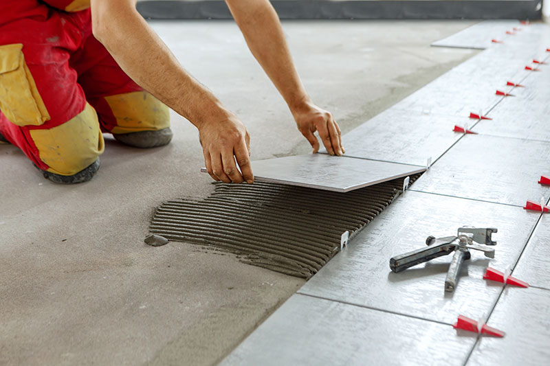 Tiling a floor during a reno